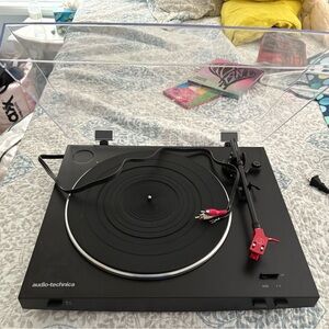 Audio Technica Black and Red Vinyl Record Player